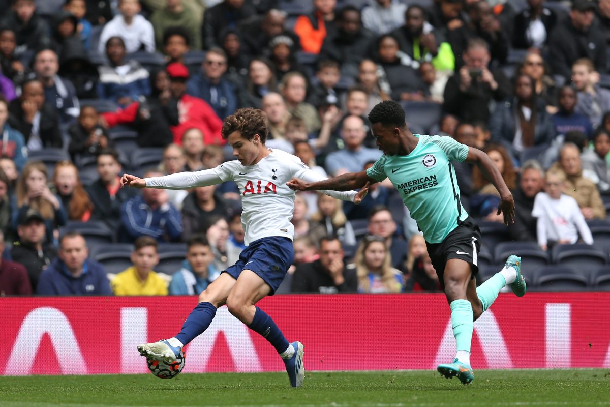 Yago Santiago of Tottenham Hotspur U23's breaks away from Zak Sturge of Brighton.