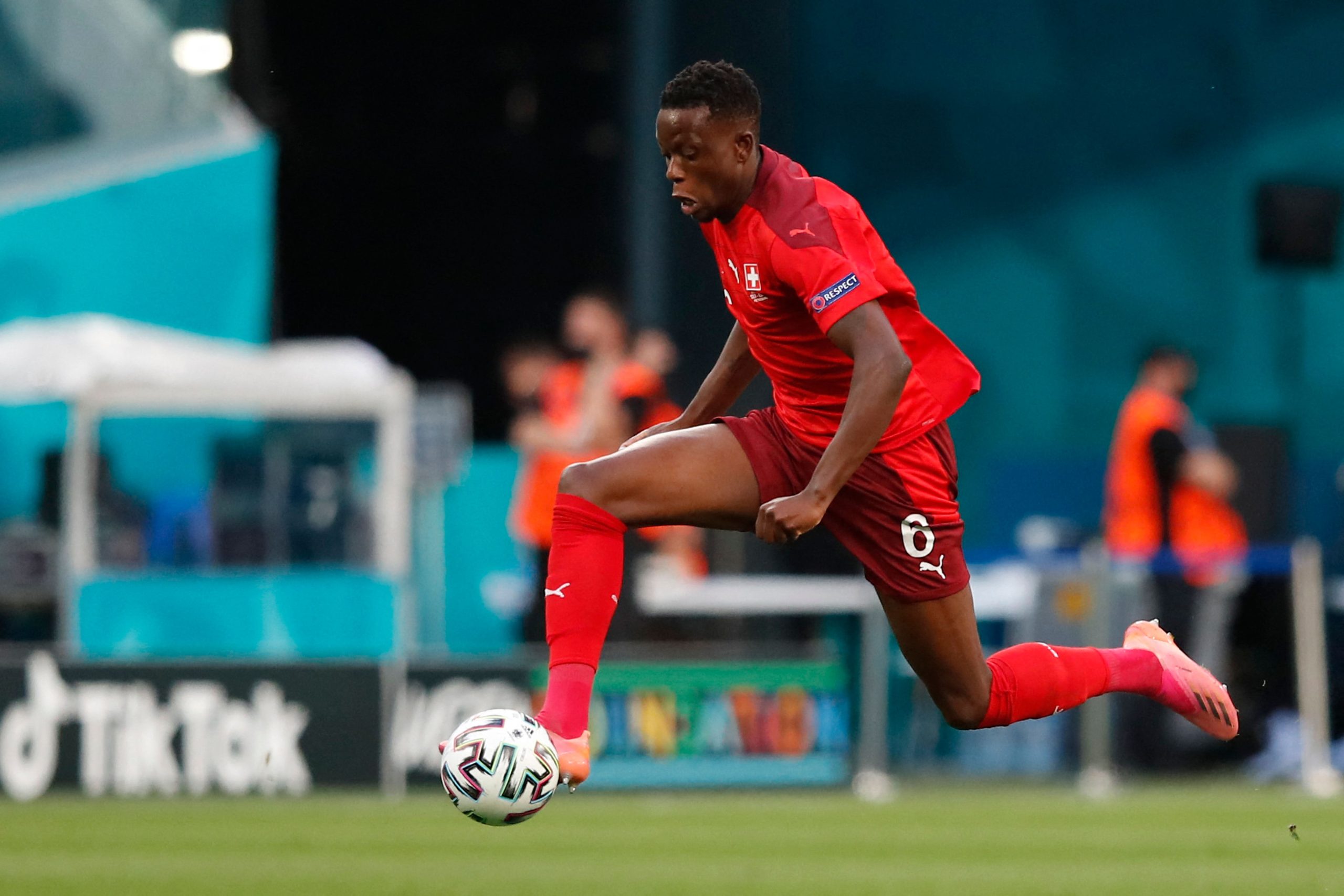 Denis Zakaria runs with the ball during the UEFA EURO 2020 quarter-final match between Switzerland and Spain.
