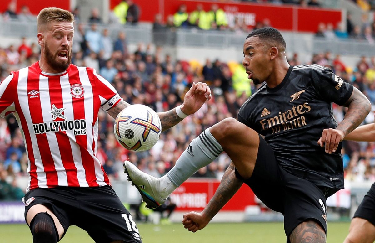 Pontus Jansson of Brentford vies for the ball with Arsenal's Gabriel Jesus.