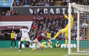 Kepa Arrizabalaga of Chelsea makes a save from Danny Ings of Aston Villa.