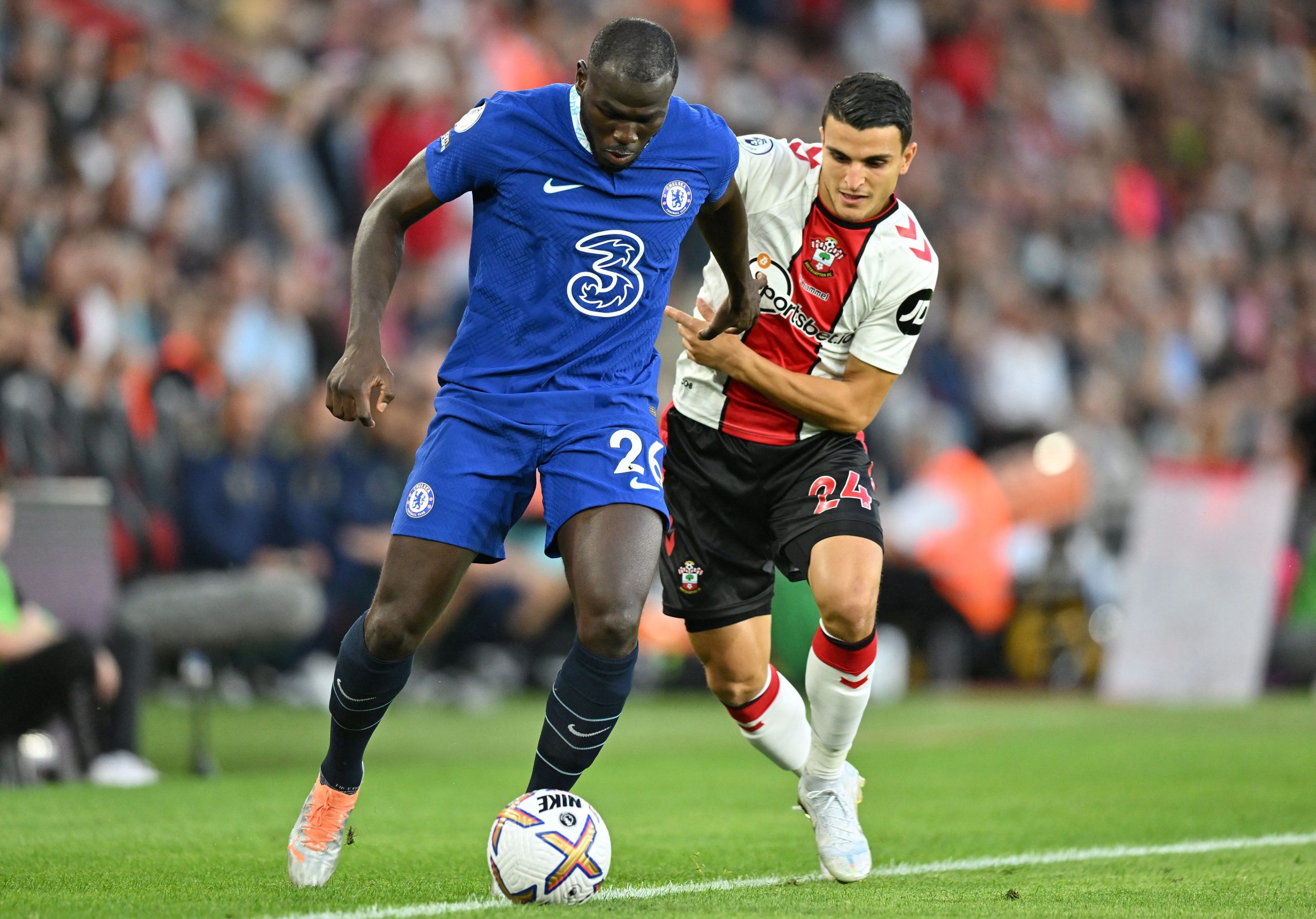 Mohamed Elyounoussi vies for possession with Chelsea defender, Kalidou Koulibaly.