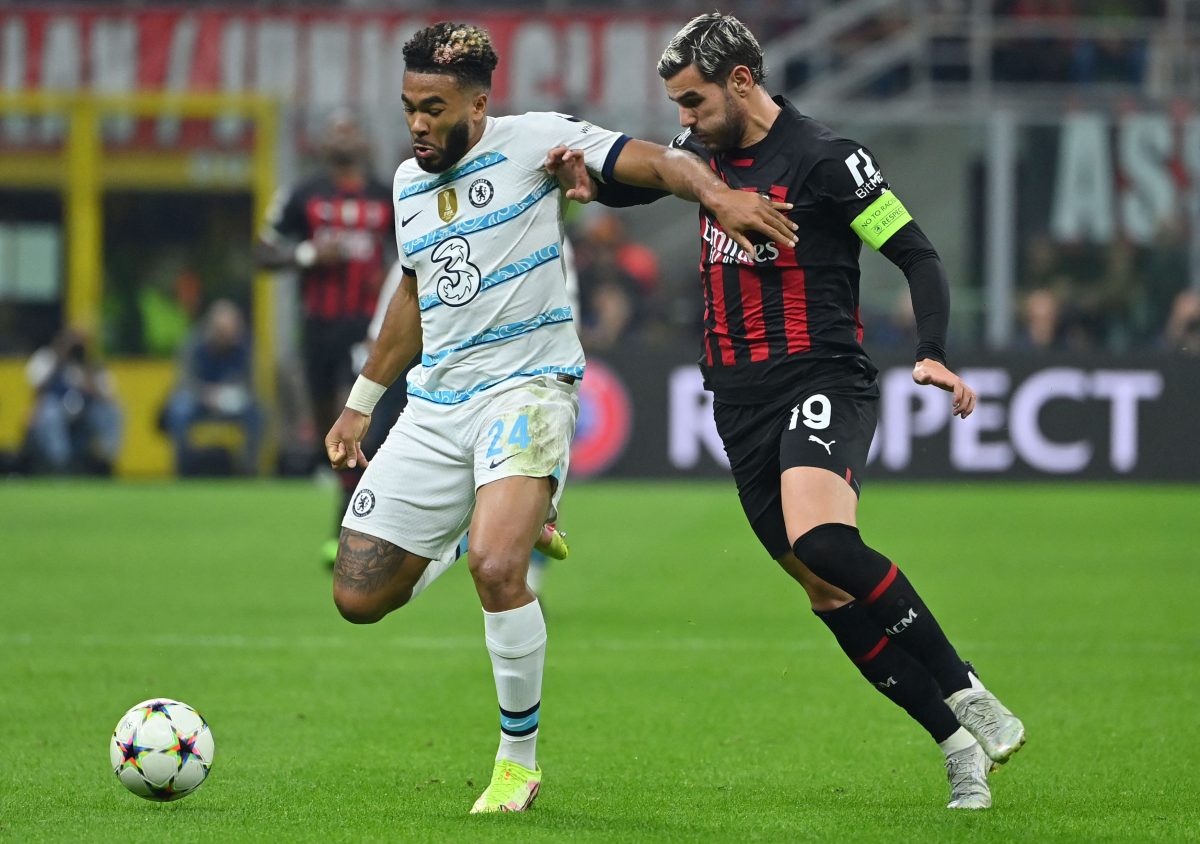 Reece James fights for the ball with AC Milan's Theo Hernandez during a UEFA Champions League match at San Siro in October 2022.