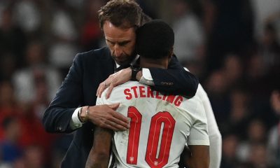 England's Gareth Southgate embraces Chelsea's Raheem Sterling after the UEFA EURO 2020 final.