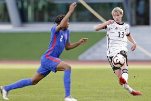 Triston Rowe of U16 England challenges Laurin Preuß of U16 Germany. (Photo by Ricardo Nascimento/Getty Images for DFB)