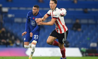 Hakim Ziyech of Chelsea battle for possession with Sander Berge of Sheffield United.