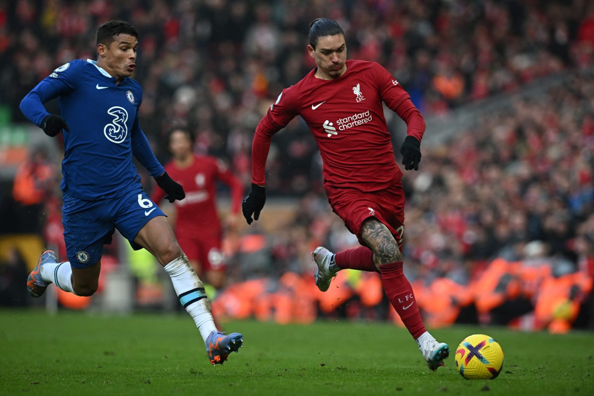 Chelsea's Brazilian defender Thiago Silva (L) fights for the ball with Liverpool's Uruguayan striker Darwin Nunez during the English Premier League football match between Liverpool and Chelsea at Anfield in Liverpool.