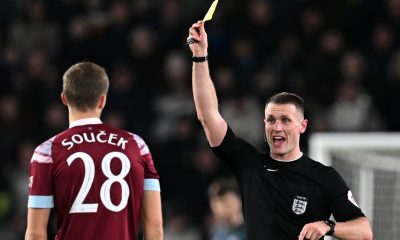 Referee Thomas Bramall shows a yellow card to West Ham United's Czech midfielder Tomas Soucekagainst Chelsea. (Photo by PAUL ELLIS/AFP via Getty Images)