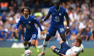 Marc Cucurella of Chelsea is challenged by Dejan Kulusevski of Tottenham Hotspur as Kalidou Koulibaly looks on.
