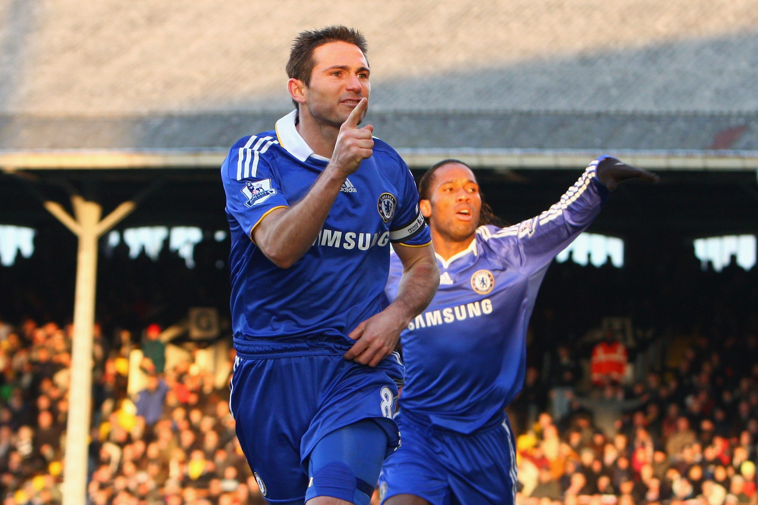 Frank Lampard (L) of Chelsea and teammate Didier Drogba celebrate after scoring a goal against Fulham - 2008.