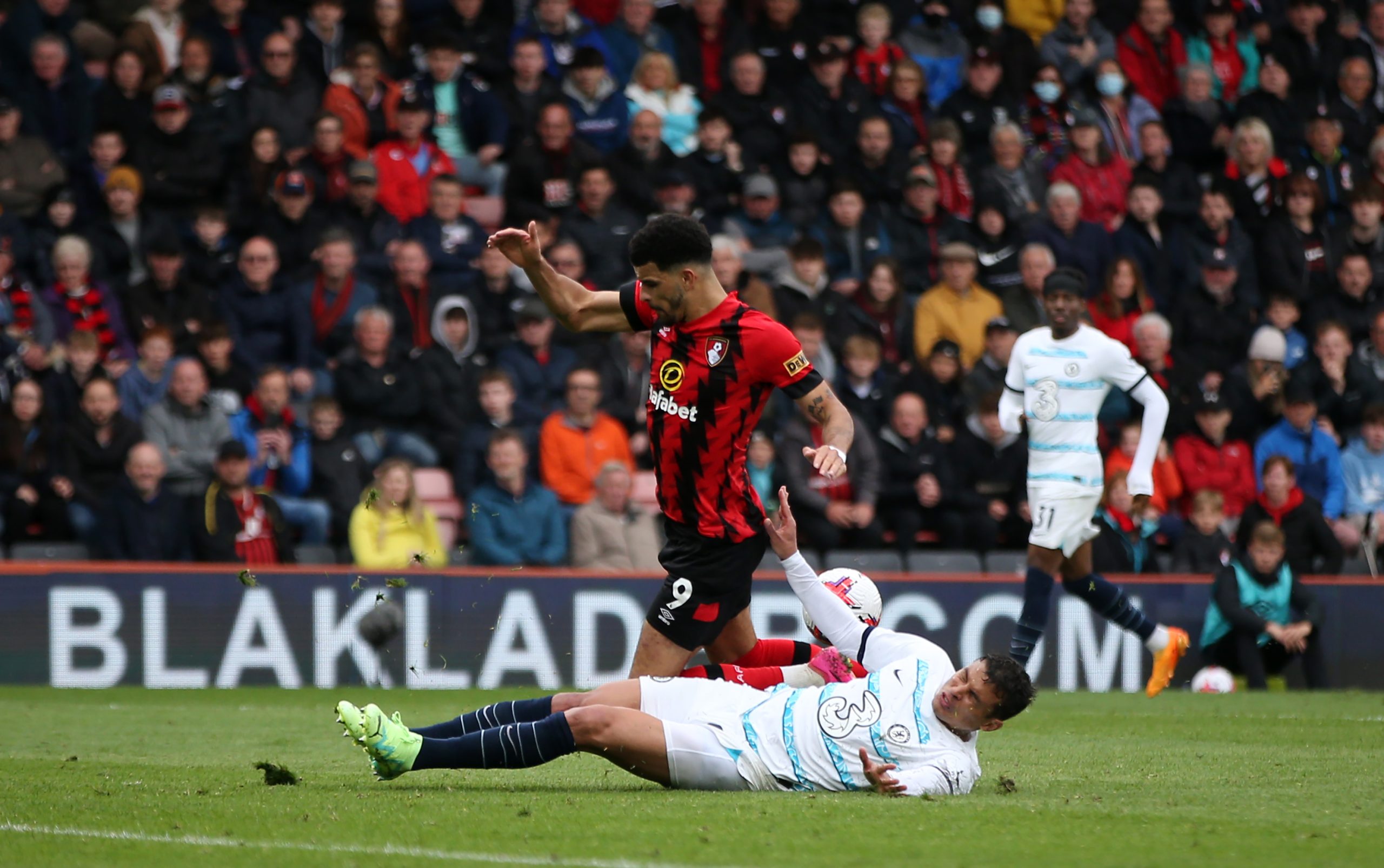 Dominic Solanke of AFC Bournemouth is challenged by Thiago Silva of Chelsea.
