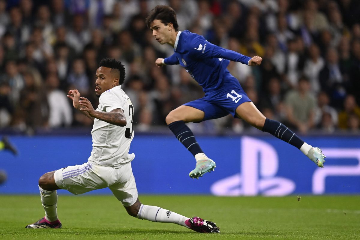 Real Madrid's Brazilian defender Eder Militao vies with Chelsea's Portuguese forward Joao Felix.