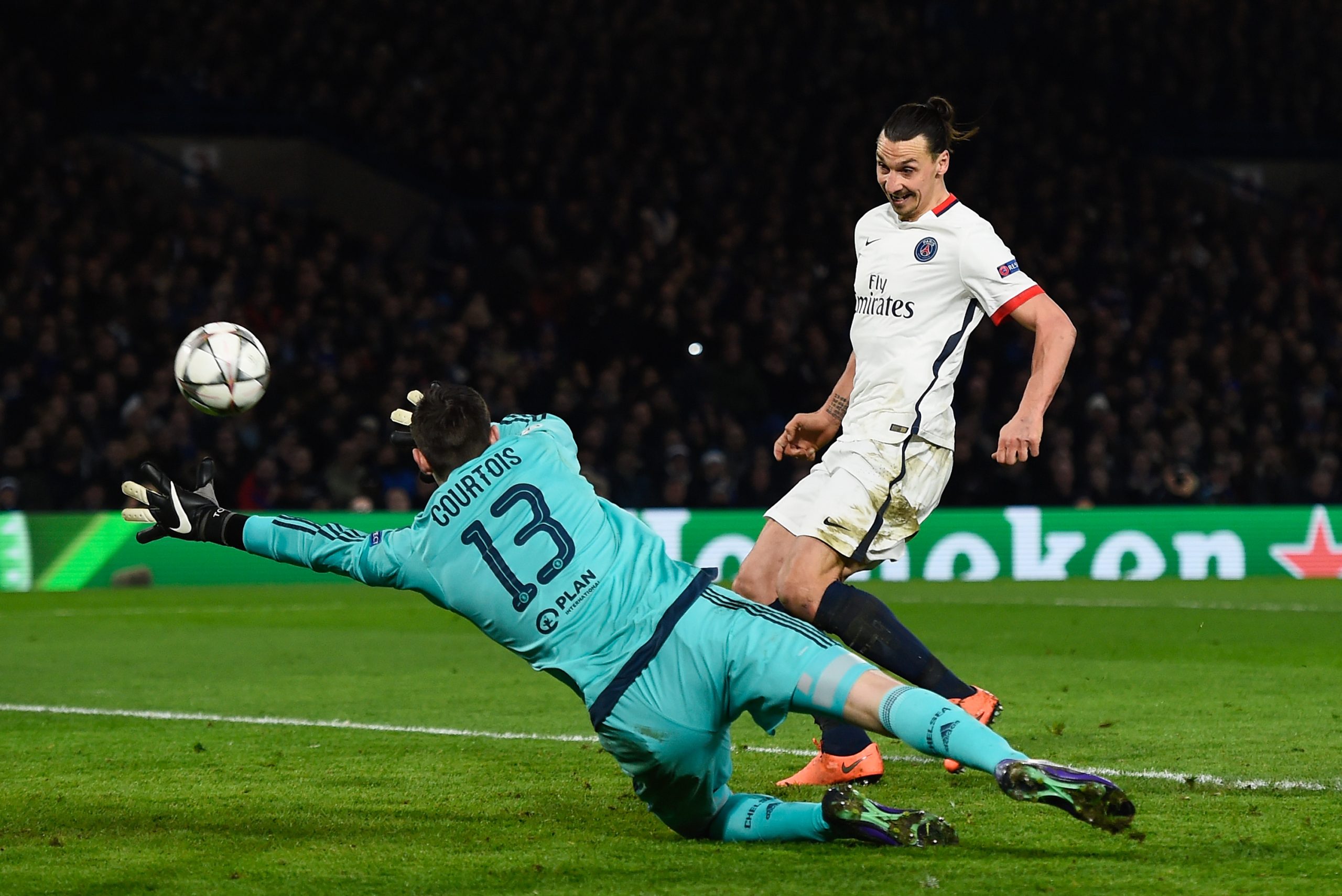 Zlatan Ibrahimovic of PSG scores his team's second goal past goalkeeper Thibaut Courtois of Chelsea - March 2016.