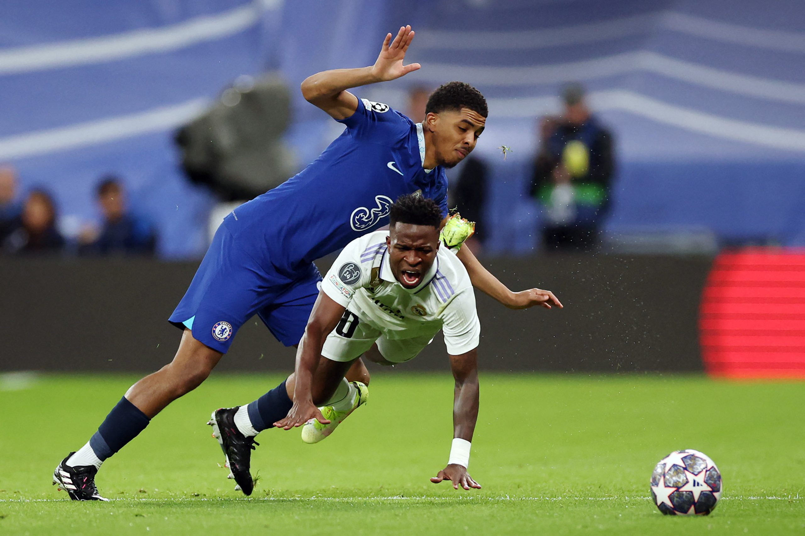 Chelsea's French defender Wesley Fofana vies with Real Madrid's Brazilian forward Vinicius Junior.